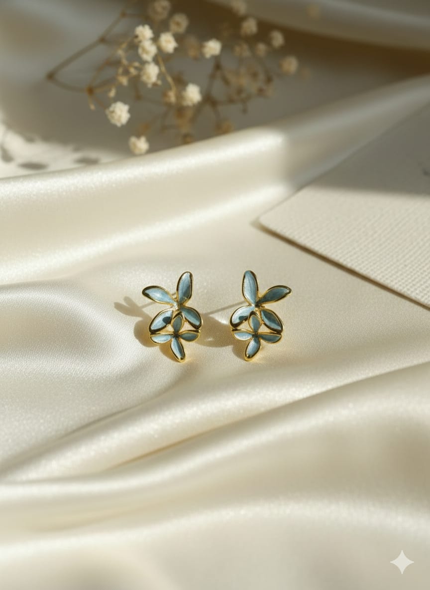 Light Blue Enamel and Gold-Toned Floral Stud Earrings.